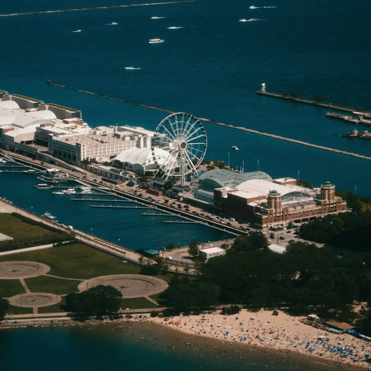 Aerial view of Navy Pier and its Ferris wheel on the Lake Michigan shoreline